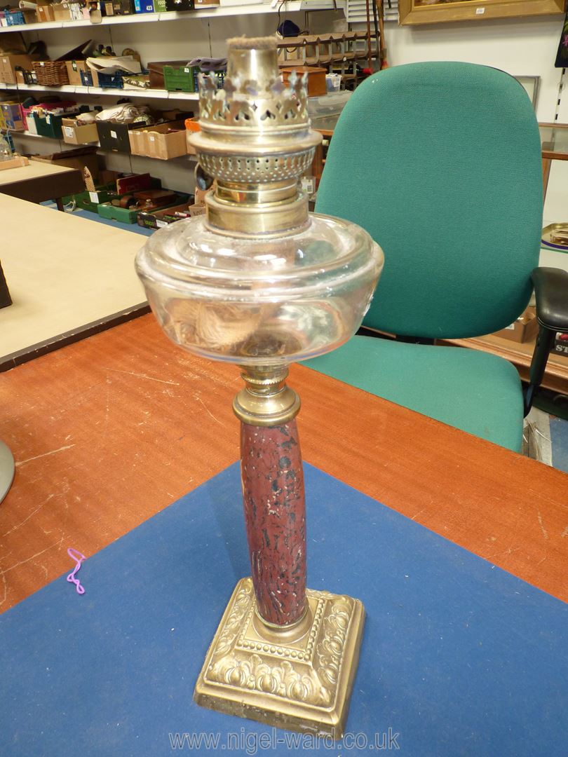 An Oil lamp on square brass bass, marbled effect stand, clear glass reservoir, no shade or chimney, - Image 3 of 12