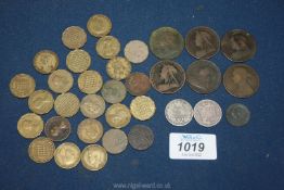 A small quantity of threepenny bits, six Victorian pennies,