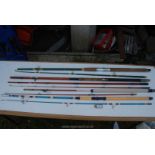 Four vintage Sea Fishing Rods including 'Garbo Perfection'.
