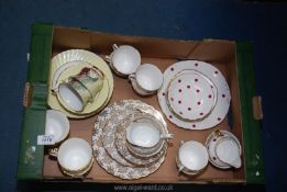 Three part china tea services to include; a polka dot set,