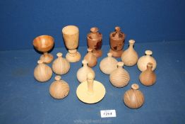 Assorted hand turned wooden items to include; a darning mushroom, small vases, etc.