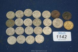 A quantity of English coinage including sixpences, 1881 farthing, a shilling and a quarter shilling.