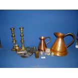 A quantity of mixed metals including two copper ale jugs, pair of brass candlesticks, owl ornaments,