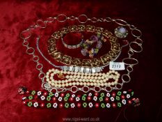 Miscellaneous vintage costume jewellery including white metal chain link belt, bracelets, necklaces,