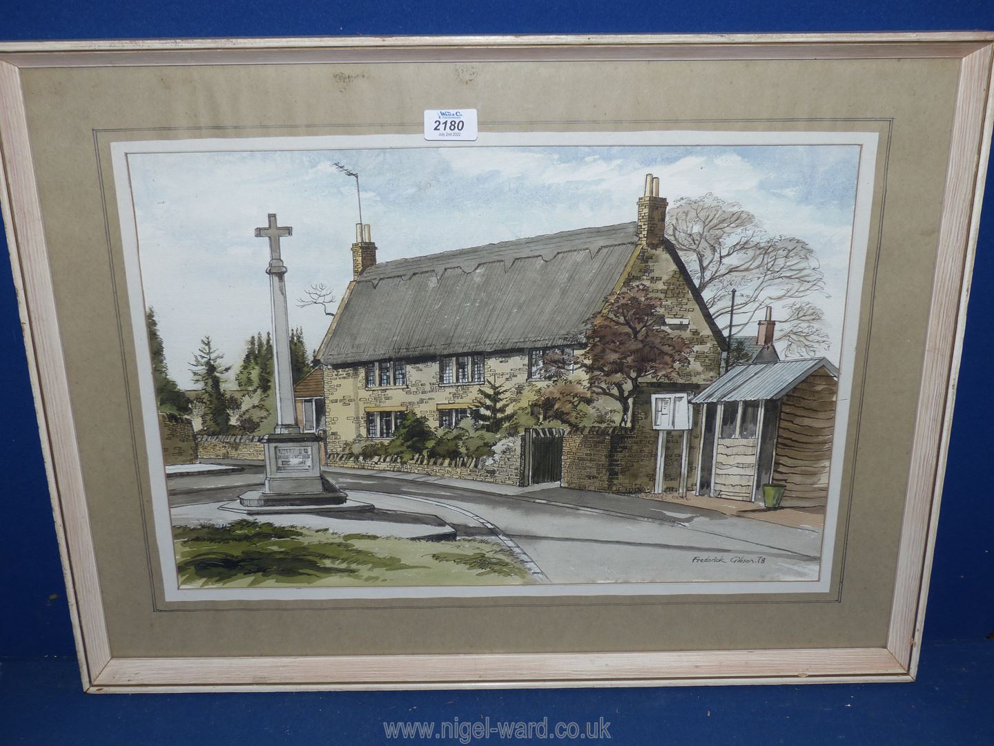 A large Watercolour of a Northamptonshire village by Frederick Gibson, signed and dated 1978.