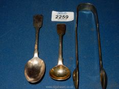 A pair of silver sugar tongs,