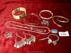 Miscellaneous ethnic style earrings, bracelets, snake bangle and others including some silver.