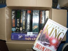 A small quantity of Stephen King novels.
