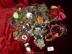 A large quantity of miscellaneous costume jewellery including bangles, vintage items,