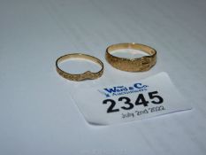 Two 9ct gold rings in a buckle design. 2.3 gms total approx. (1.7 & 0.6 gms approx.).