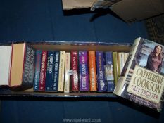 A quantity of Catherine Cookson novels.