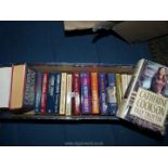 A quantity of Catherine Cookson novels.