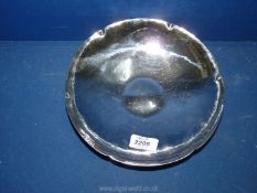 A signed Keswick School of Industrial Art stainless steel Dish in hammered finish, 9'' diameter.