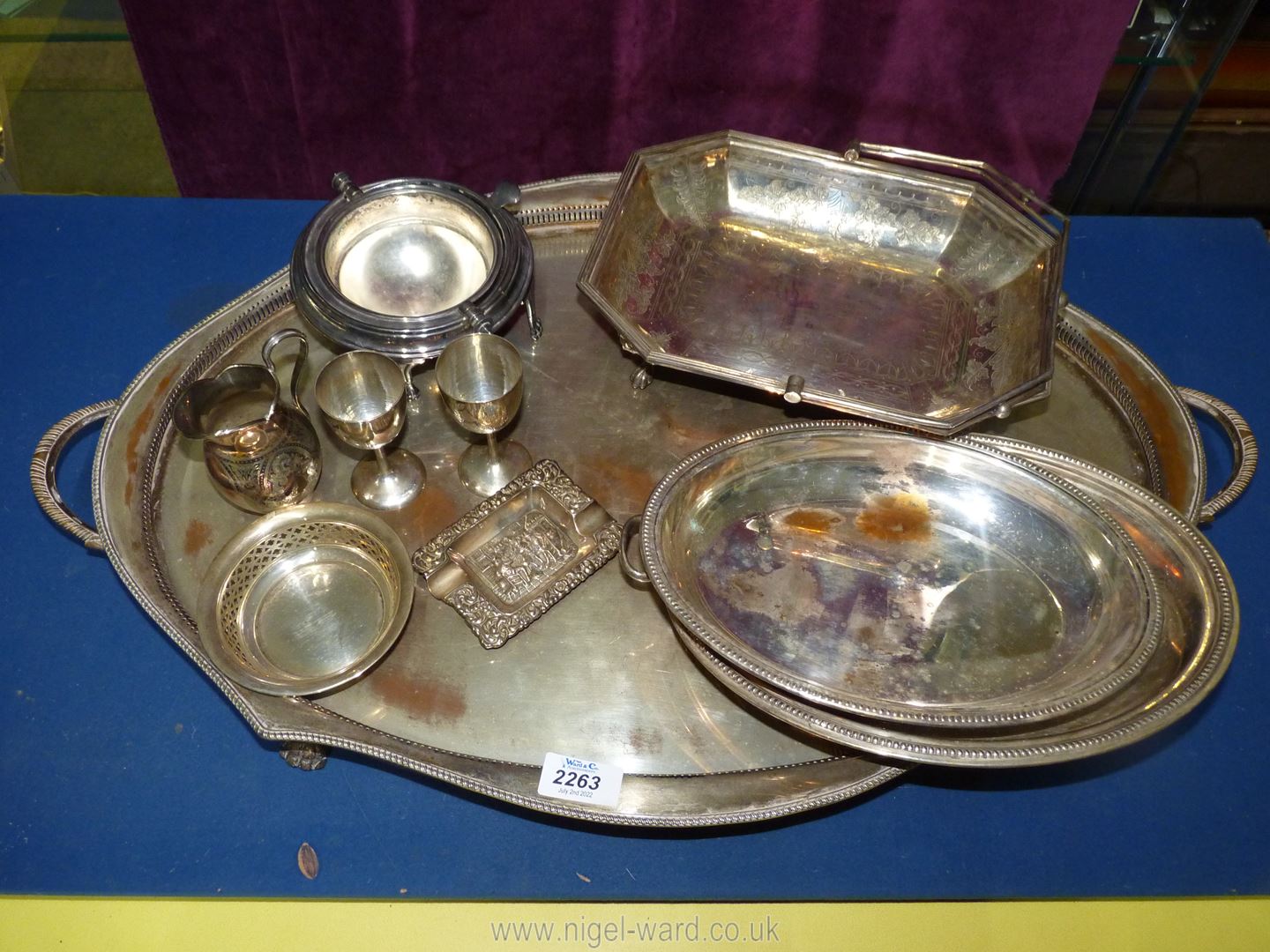 A plated bread basket, serving dish, large serving tray, ashtray, cream jug, etc.