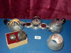 Two stainless steel teapots (boxed), tea strainer (boxed) and cruet.