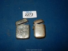 A Silver vesta case and another vesta case, unmarked.