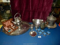 A plated galleried two handle tray, five serviette rings, small coffee pot,