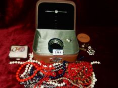 A quantity of costume jewellery including beaded necklaces, brooch, miscellaneous cufflinks,