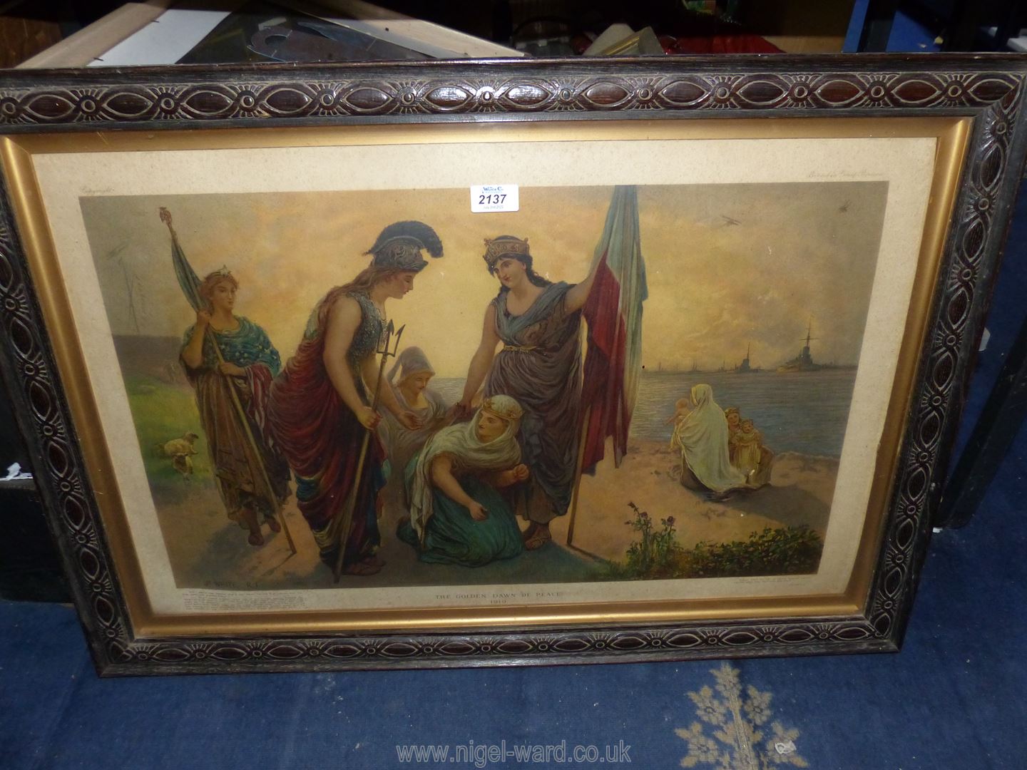 A large wooden framed J.M. White print ' The golden dawn of peace', 34 1/4" x 23 1/2".