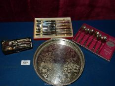 A small quantity of plate including galleried card tray, boxed teaspoons and butter knives.