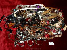 A quantity of miscellaneous costume jewellery, beads, etc.