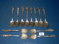 A set of twelve Charles Dickens 'Christmas Carol' spoons, possibly Pewter.
