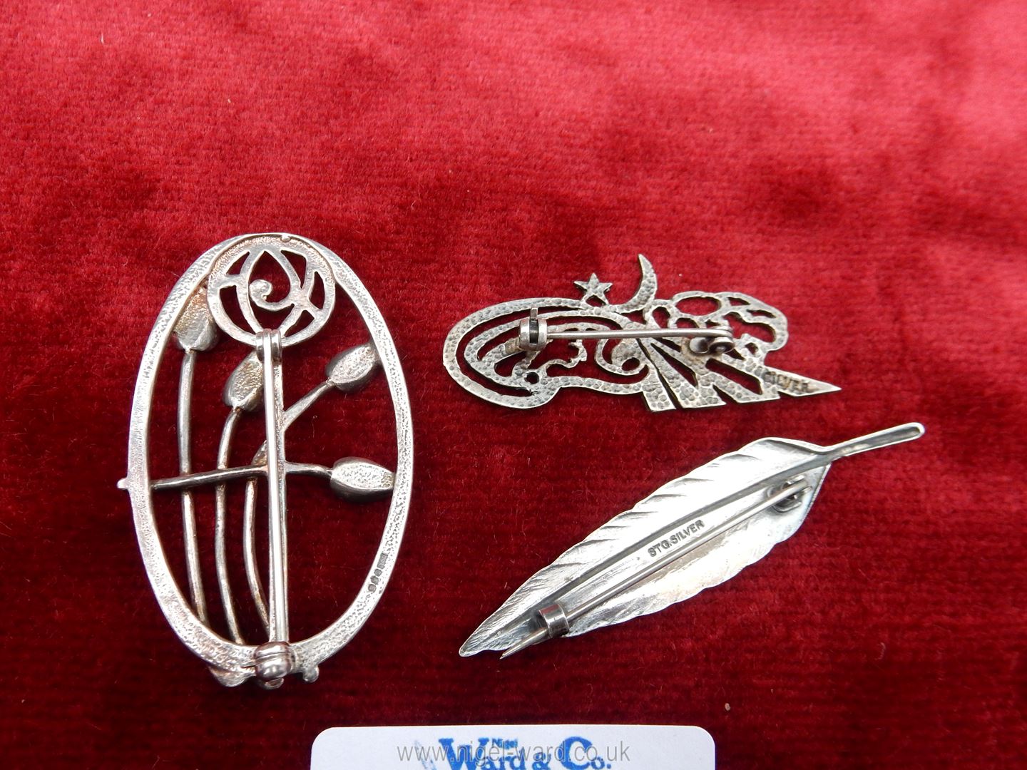 Three silver brooches including feather with enamelled front, Liberty style floral, - Image 2 of 2