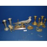 A quantity of small brass candlesticks, two plated vases, plated pheasant,