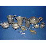 A quantity of Pewter including hammered teapot, jug and sugar bowl, two tankards, etc.