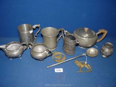 A quantity of Pewter including hammered teapot, jug and sugar bowl, two tankards, etc.