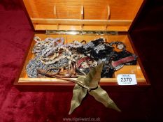 A quantity of costume jewellery: a shell necklace, etc.