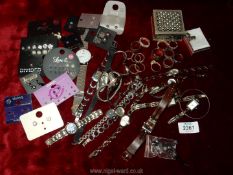A quantity of jewellery including earrings, rings, watches, etc.