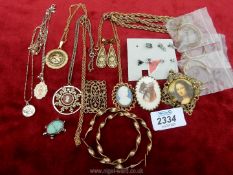 A small quantity of Costume Jewellery including stud earrings, chains, hoops, scarf clip, etc.