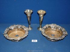 A pair of wine coasters with grape leaf decoration, one engraved AMO and crest of deer,