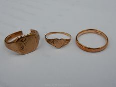 A 9ct. gold wedding band, signet ring (a/f.) and a child's ring. 6.3 gms total, approx.