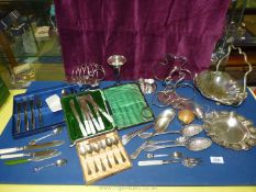 A quantity of EPNS including toast rack, crested ware jug and bowl, cased set of teaspoons,