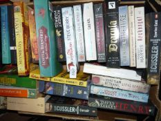 A box of novels to include; Steve Berry, Louis De Bernieres, Bill Napier, etc.