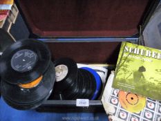 A small wooden trunk containing unsleeved 45 rpm records to include; Tom Jones, The Shadows,