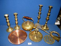 A quantity of brass including two pairs of candlesticks, copper kettle, trivet, car horn, etc.