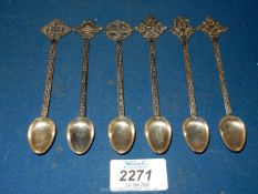 A set of six white metal teaspoons each with a different elaboration of a Maltese Cross terminal.