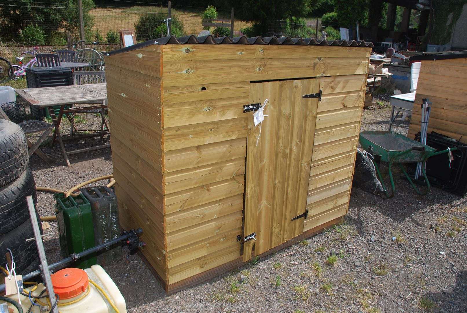 A garden store with lockable door.