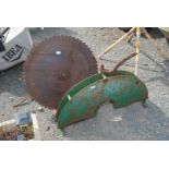 A circular saw guard, 28" circular blade, etc.