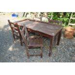 A wooden patio set including 4 chairs and a table 59" long x 28" wide x 27" high (in need of