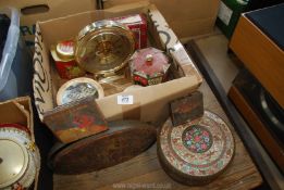 A quantity of old tins, clock, etc.