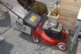 An 'IBEA' petrol mower with grass box.