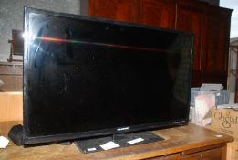 A 40" Blaupunkt TV with remote.