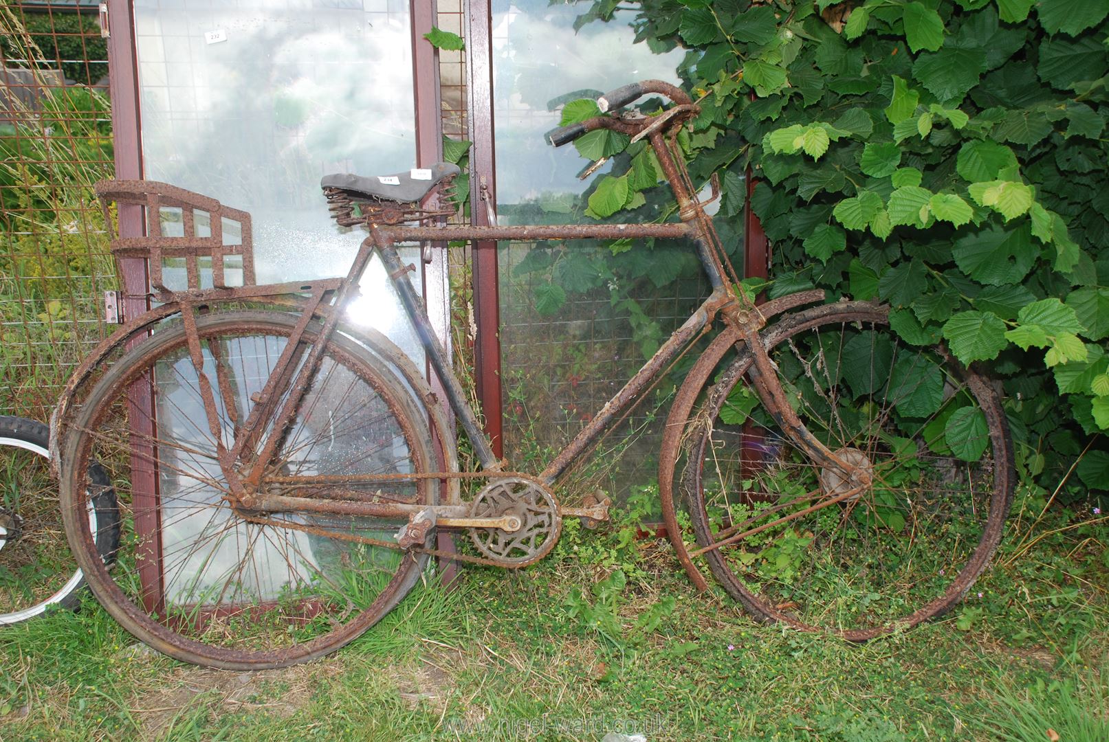 A gents vintage bike with child carrier - for restoration.