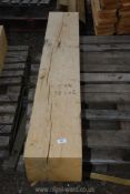 A piece of oak 9 3/4" x 6 3/4" x 58 1/2" long.