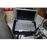 A Venturer portable DVD player with travel case.