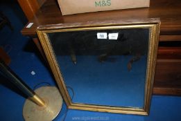 A gilt framed mirror 19" x 21".